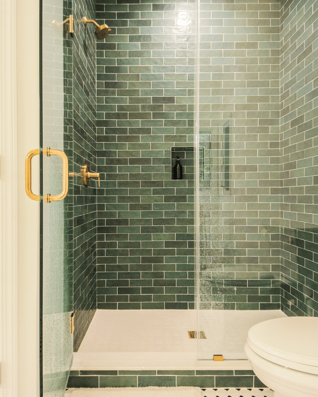 Elegant lighting design by Shades of Light in a tranquil bath during a master bath renovation